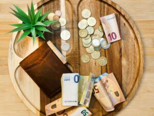 Wallet with euro banknotes and coins representing personal finance and savings